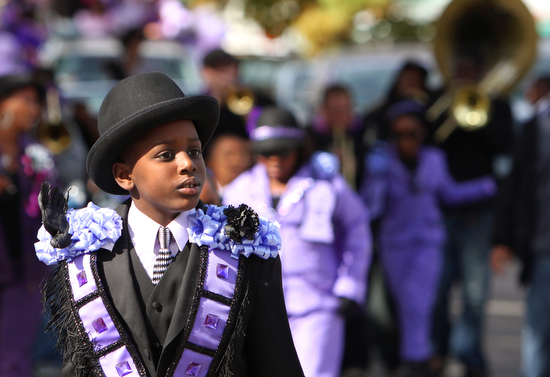 The Original New Orleans Junior Buckjumpers second line travels thru Gert Town Sunday afternoon. (Sabree Hill, UptownMessenger.com)