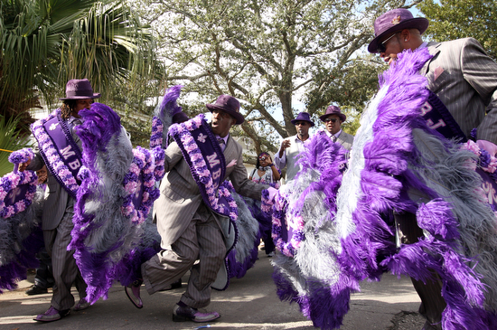 The Original New Orleans Ladies, Men and Junior Buckjumpers annual second line travels thru Gert Town Sunday afternoon. (Sabree Hill, UptownMessenger.com)