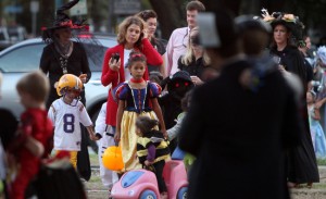 Children trick or treating at the corner of St. Charles and State St. Sunday evening.