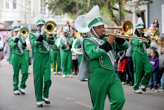 The Walter L. Cohen High School marching band performs during the Krewe of Mid-CIty parade in 2012. (UptownMessenger.com file photo by Sabree Hill)