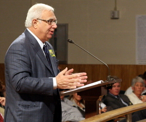 Tulane President Scott Cowen speaks about the university's proposed stadium at City Hall in June 2012. (UptownMessenger.com file photo by Robert Morris)