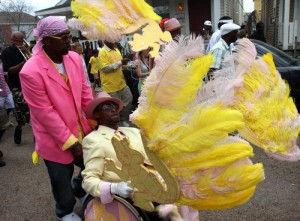 Pigeontown Steppers president Joseph “Rollin' Joe” Henry second lines up General Ogden in west Carrollton on Easter Sunday in 2013. (UptownMessenger.com file photo by Robert Morris)
