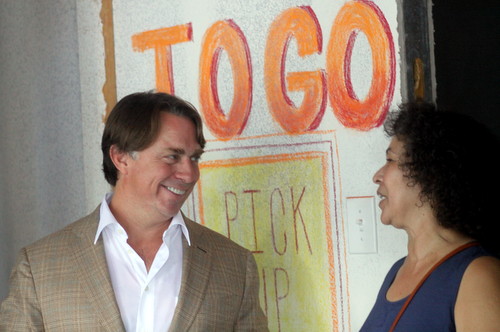 John Besh greets a neighbor of the his new Pizza Domenica restaurant proposed for 4933 Magazine Street. (Robert Morris, UptownMessenger.com)
