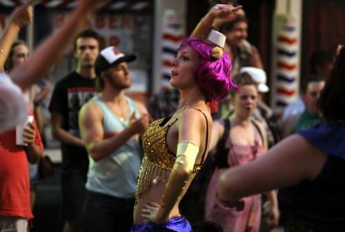 A dancer in the Krewe of OAK parade on Oak Street. (Robert Morris, UptownMessenger.com)