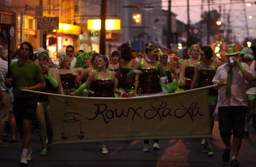 Roux La La dances down Oak Street in the Krewe of OAK parade. (Robert Morris, UptownMessenger.com)