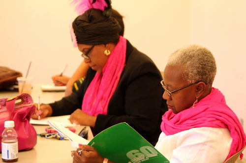 Cherice Harrison-Nelson and Blenda Robertson participate in the Poems and Pink Ribbons workshop. (photo courtesy of Kelly Harris)