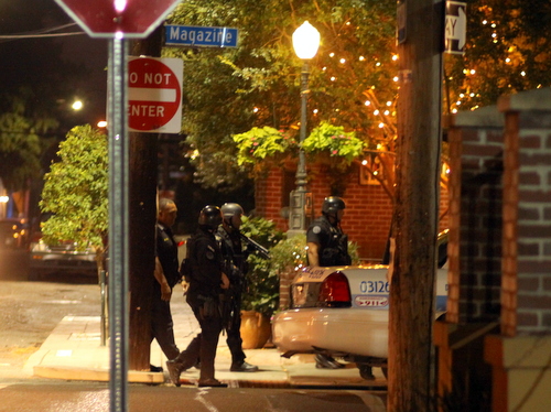 The SWAT Team marches on Magazine Street. (Robert Morris, UptownMessenger.com)