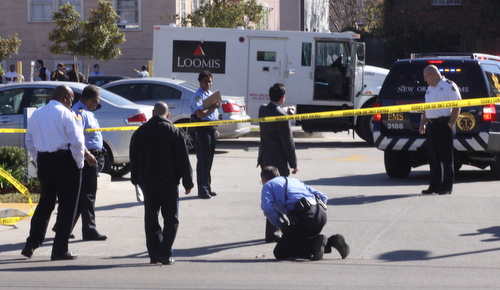 Police look for evidence after a December 2013 fatal shooting at the Chase bank on South Carrollton. (UptownMessenger.com file photo by Robert Morris)