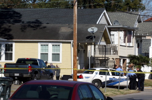 Police investigate the scene of a fatal shooting at Calhoun and Hewes streets. (Robert Morris, UptownMessenger.com)