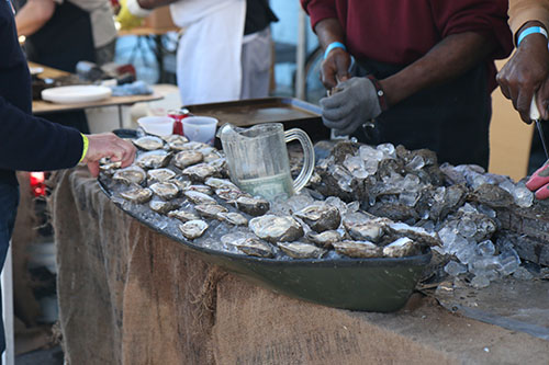 Raw oysters from Woody’s Fish Tacos were a crowd favorite at the first annual Freret Street Oyster Jam. (Zach Brien, UptownMessenger.com)