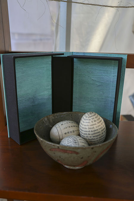 Eggs made of old library books by Yuka Petz