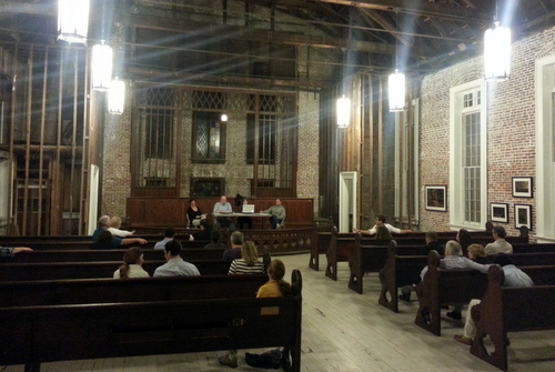 Members of the Coliseum Square Association meet Monday night in the Felicity Church, which is under renovation by a private owner. The association has been advocating for a similar future for the nearby Spanish-American Church building on Sophie Wright Place. (Robert Morris, UptownMessenger.com)