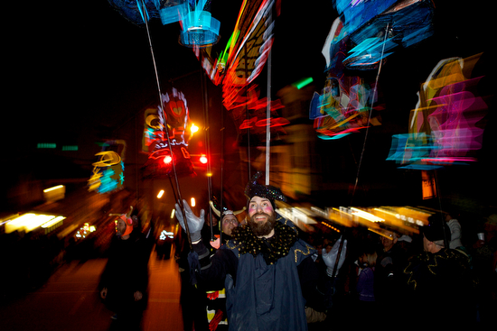 Butterfly and shoe light puppets march near the front of the Krewe of Muses. (Sabree Hill, UptownMessenger.com)