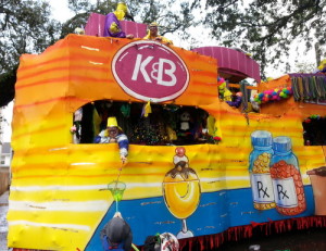 The Krewe of Alla's K&B float rolls on Magazine Street. Officials have not said which floats the riders who were injured fell from. (Robert Morris, UptownMessenger.com)