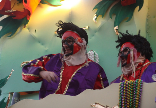 Riders on the Babylon "Masks" float. (Robert Morris, UptownMessenger.com)