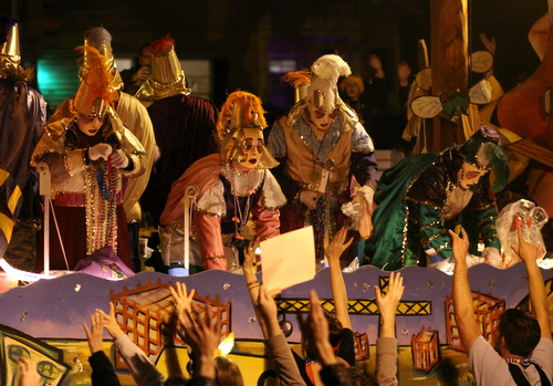 Riders on the Krewe d'Etat "Ladies Night" float. (Robert Morris, UptownMessenger.com)