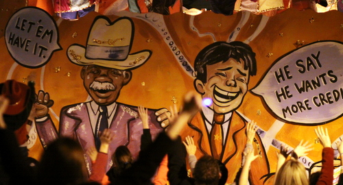 The Krewe d'Etat "Running a Tab" float invokes classic New Orleans characters to mock the national debt. (Robert Morris, UptownMessenger.com)