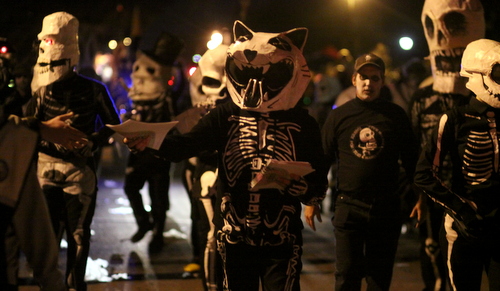 The Skeleton Krewe leads Krewe d'Etat up Napoleon Avenue. (Robert Morris, UptownMessenger.com)