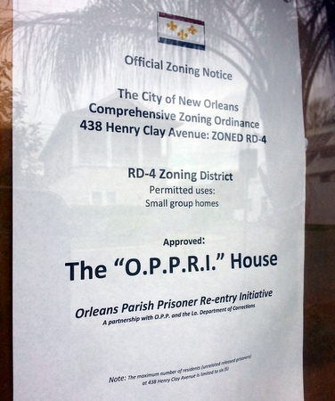 A sign at the Uptowner alerting neighbors of a proposed prisoner re-entry program. (Robert Morris, UptownMessenger.com)