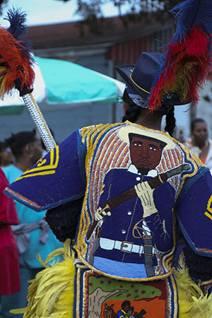 Spy boy of Golden Blades on St. Joseph's Night. (Zach Brien, UptownMessenger.com)