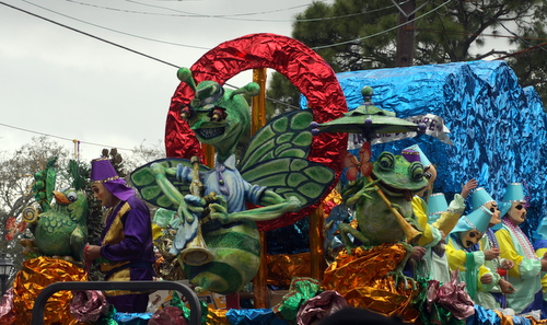 The Krewe of Mid-City's "Green Hornet" float rolls on Magazine Street. (Robert Morris, UptownMessenger.com)