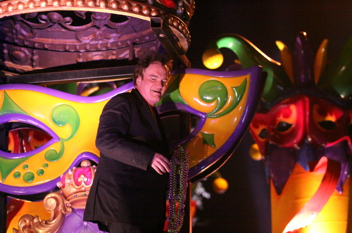 Quentin Tarantino rides in the Krewe of Orpheus. (UptownMessenger.com)