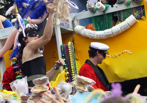 "Save Tucks TP" reads a string of toilet-paper rolls on a Tucks float. (Robert Morris, UptownMessenger.com)