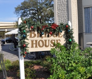 The Bridge House sign at Grace House decorated during the winter holidays. (UptownMessenger.com file photo by Marta Jewson)