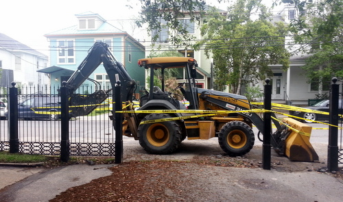 At least two sections of the Newcomb Boulevard fence have been removed as of Tuesday morning. (Robert Morris, UptownMessenger.com)