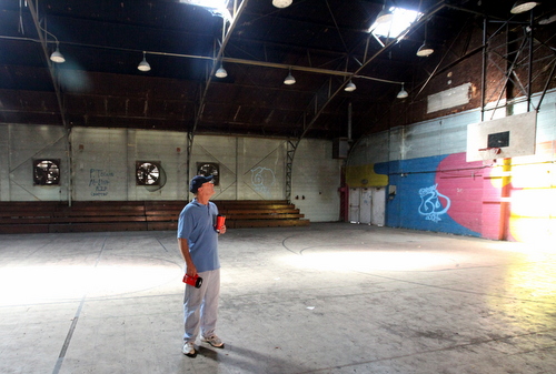 Jim McPhaille of Lycee Francais takes a look at the Priestley gym. (Robert Morris, UptownMessenger.com)