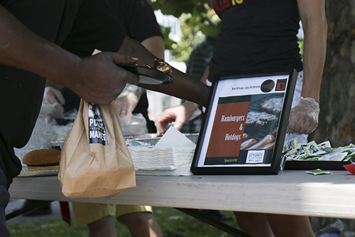Complimentary burgers and hot dogs provided by Uptown Campus Dining. (Zach Brien, UptownMessenger.com)