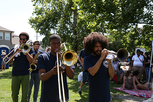Horns and reeds from the New Orleans Jazz Orchestra lead a mini second line before the whole Orchestra began to play. (Zach Brien, UptownMessenger.com)