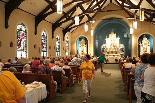 The Feast of St. Henry mass took place at 3 pm right before the block party. (Zach Brien, UptownMessenger.com)
