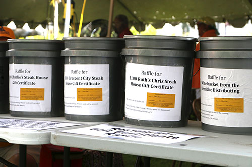 Raffle tickets for steak houses and wine baskets helped to pay for Saturday's block party. (Zach Brien, UptownMessenger.com)