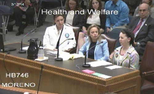 Kara Morgan (right) testifies before the Louisiana House of Representatives Health and Welfare Committee in support of a bill banning minors from tanning beds. (via house.louisiana.gov)