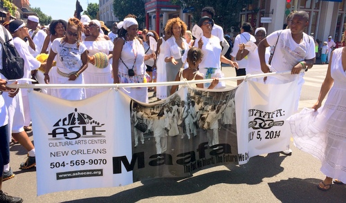 Participants in the Maafa ceremony march through the French Quarter. (photo by jewel bush for UptownMessenger.com)