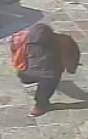 A still image of the suspect outside the business. (via NOPD)