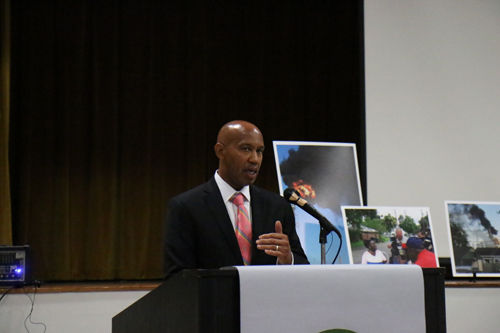 The Rev. Earl Williams speaks against a railroad through Hollygrove at the GreenARMY Katrina commemoration at Xavier University. (Zach Brien for UptownMessenger.com)
