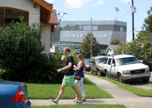 Tulane fans pass Yulman Stadium, seen from Calhoun Street. (Robert Morris, UptownMessenger.com)