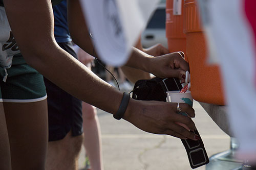 Complimentary water and gatorade, as well as coffee and adult beverages were provided to runners and attendees. (Zach Brien, UptownMessenger.com)