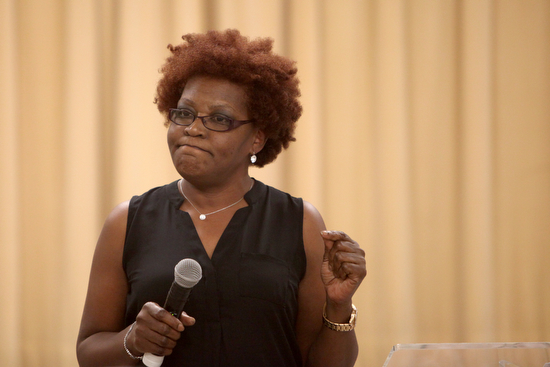 Linn James speaks at the one year anniversary of Helping Mother's Heal celebration. (Sabree Hill, UptownMessenger.com)