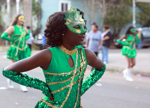 A dancer from Samuel J. Green Charter School marches in the Mystic Krewe of Femme Fatales parade. (Robert Morris, UptownMessenger.com)