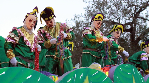 Riders in the Knights of Babylon parade atop the Jesters float. (Robert Morris, UptownMessenger.com)