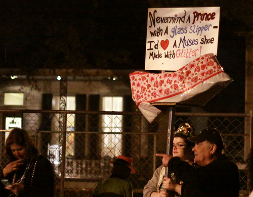 Parade-goers used elaborate signs to beseech the Muses for shoes. (Robert Morris, UptownMessenger.com)