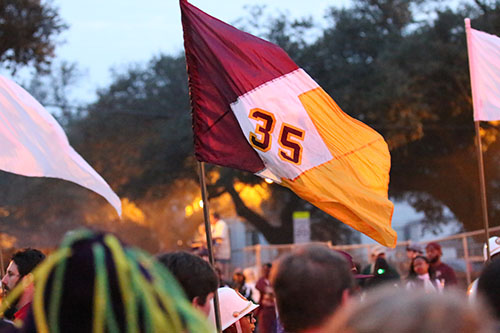 A breeze caught the flag from the McDonough 35 flag-twirlers. (Zach Brien, UptownMessenger.com)