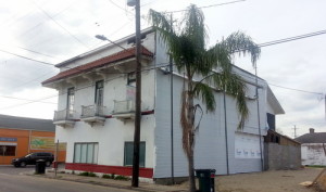 Workers have added a new wall enclosing the former laundry on the old Frank's Steak House site on Freret Street. (Robert Morris, UptownMessenger.com)