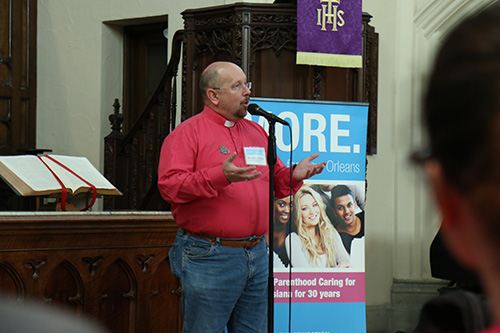 Rev. Fred Powell, pastor of the First Presbyterian Church, introduces himself to the audience. (Zach Brien, UptownMessenger.com)