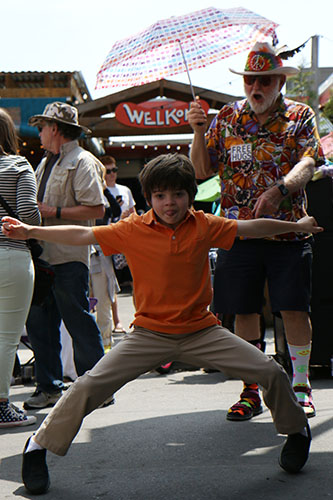 A young fan dances to Cha Wah. (Zach Brien, UptownMessenger.com)