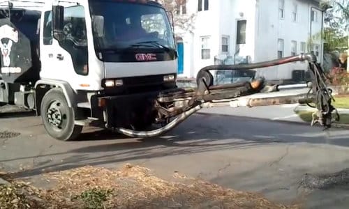 The pothole killer working on State Street Drive in Marlyville, captured on video by YouTube user "VideoNOLA." (image used with permission)