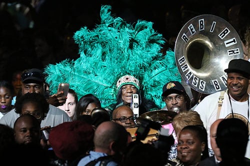 Rebirth Brass Band and Big Chief Monk Boudreaux lead a second line out at the end of the Katrina 10 commemoration at the Smoothie King Center on Saturday. (Zach Brien, UptownMessenger.com)